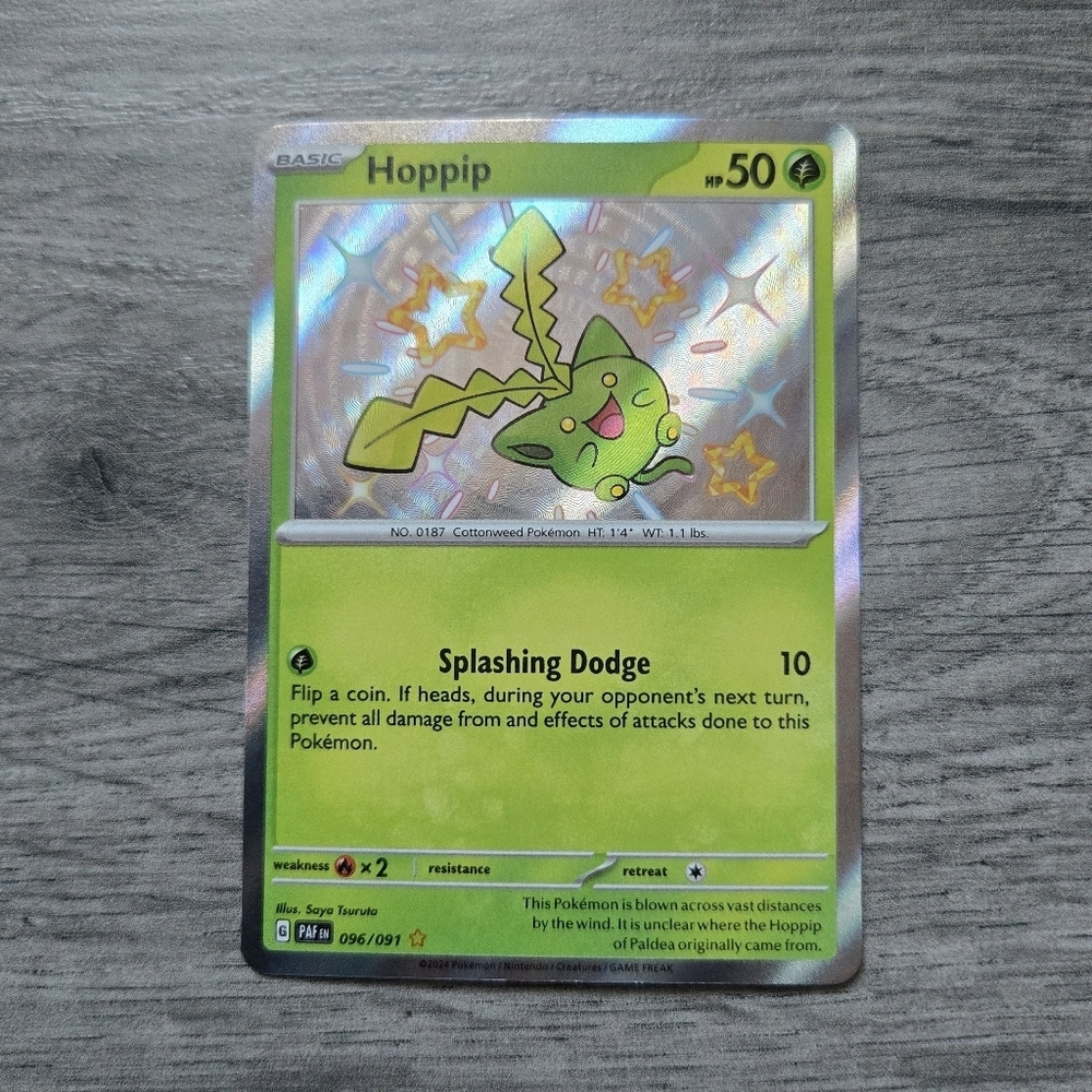 Hoppip #96 Pokemon Paldean Fates Holo Card
